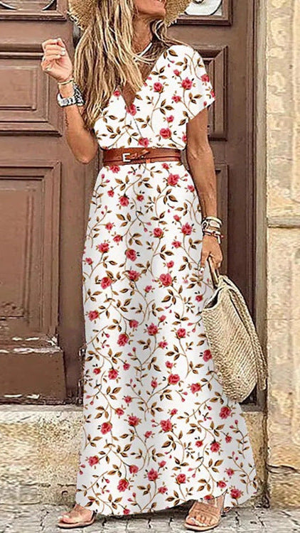 Abito lungo elegante con motivo paisley e cintura coordinata